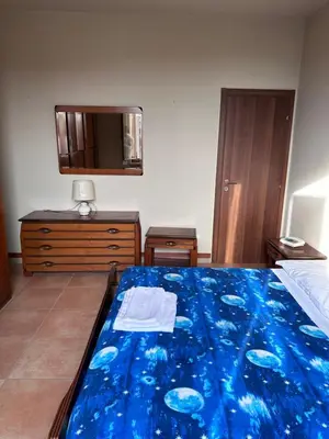 Letto o letti in una camera di Soldi 17 Cremona Stadio