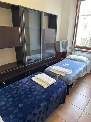 Letto o letti in una camera di Soldi 17 Cremona Stadio