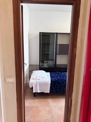 Letto o letti in una camera di Soldi 17 Cremona Stadio