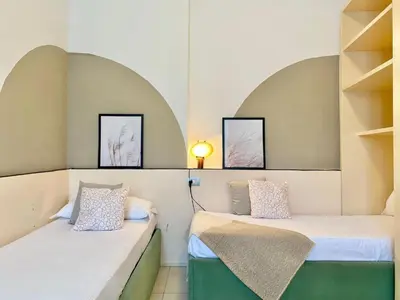 Letto o letti in una camera di La Spiaggia