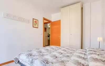 Letto o letti in una camera di Casa Drago