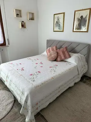 Letto o letti in una camera di Casa Vacanze Il Glicine