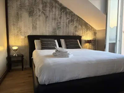 Letto o letti in una camera di The heart of Mantua