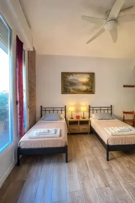 Letto o letti in una camera di Parma Station Rooms