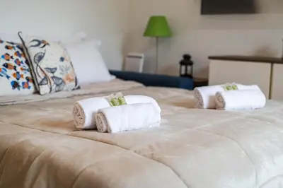 Letto o letti in una camera di Rapallo Center Near the Sea With Terrace Free Parking AC WiFi