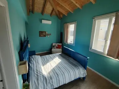 Letto o letti in una camera di Ostello Casa Peroni