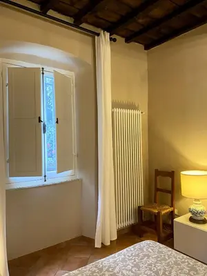 Letto o letti in una camera di La casa di Luca