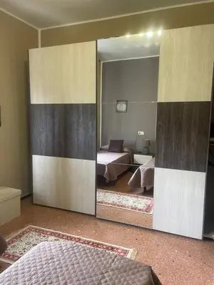 Letto o letti in una camera di Casa Mina