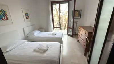 Letto o letti in una camera di Casa Angela