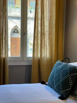 Letto o letti in una camera di Design & comfort Apartment in the very centre of Rubiera