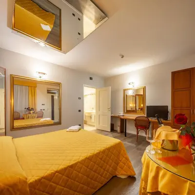 Letto o letti in una camera di Hotel Motel Sporting