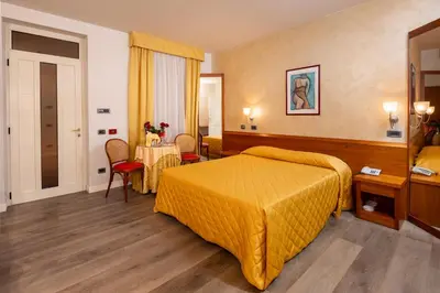 Letto o letti in una camera di Hotel Motel Sporting