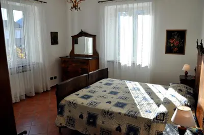 Letto o letti in una camera di Tana Degli Orsi