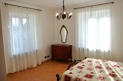 Letto o letti in una camera di Tana Degli Orsi