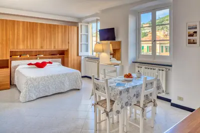 Letto o letti in una camera di Studio Paola - Levanto