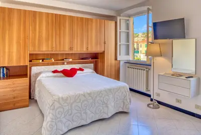 Letto o letti in una camera di Studio Paola - Levanto