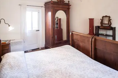 Letto o letti in una camera di Chiara House