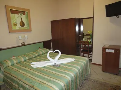 Letto o letti in una camera di Hotel Italia City Center