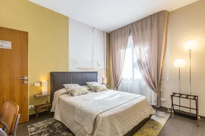 Letto o letti in una camera di B&b Igea 50