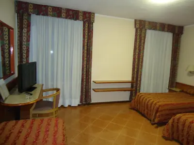 Letto o letti in una camera di Hotel Paris