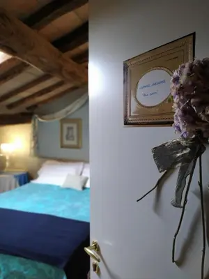 Letto o letti in una camera di Agriturismo Il Gelso