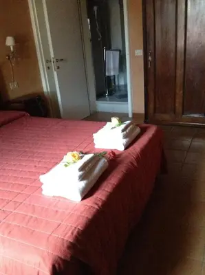 Letto o letti in una camera di Agriturismo Il Gelso
