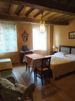 Letto o letti in una camera di Agriturismo Il Gelso