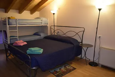 Letto o letti in una camera di Ostello Castello Mina Della Scala