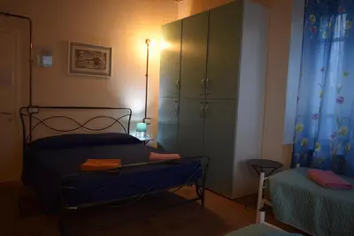 Letto o letti in una camera di Ostello Castello Mina Della Scala