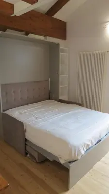 Letto o letti in una camera di La Baita D'Oro Ristorante Residence