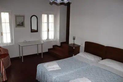 Letto o letti in una camera di Le Magnolie Agriturismo