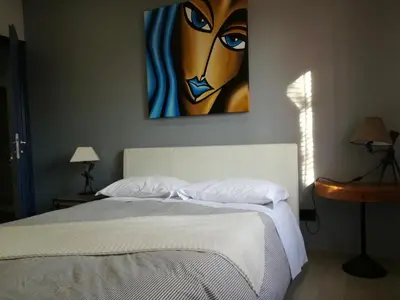 Letto o letti in una camera di La Fenice
