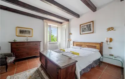 Letto o letti in una camera di Villa Poss