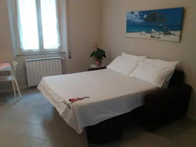 Letto o letti in una camera di Casa Eva 2010