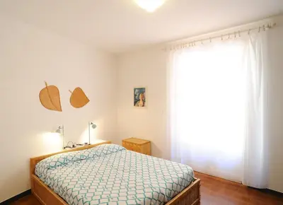 Letto o letti in una camera di Sivori Apartment