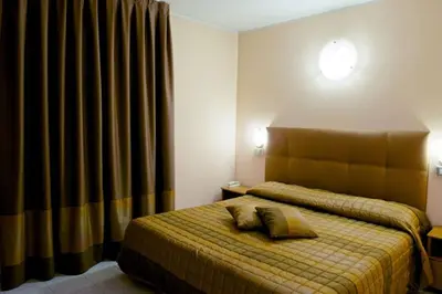 Letto o letti in una camera di Hotel Europa
