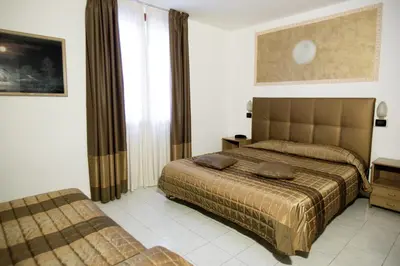 Letto o letti in una camera di Hotel Europa