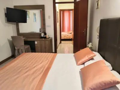 Letto o letti in una camera di Hotel Europa