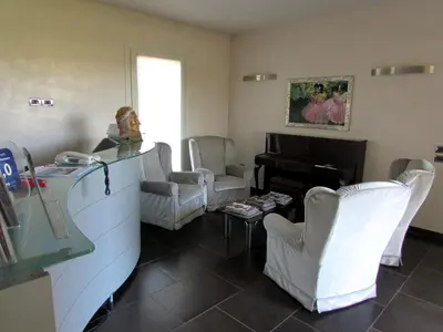 Area soggiorno di Hotel Dante Residence