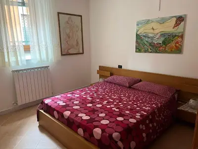 Letto o letti in una camera di Appartamento vicino al mare