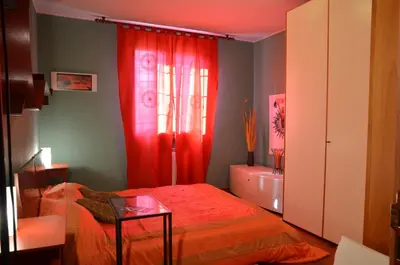 Letto o letti in una camera di La Casetta