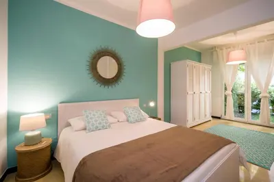 Letto o letti in una camera di Cinque Terre Moneglia Apartments