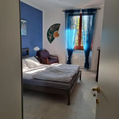 Letto o letti in una camera di B&B La Terrazza Sui Fieschi