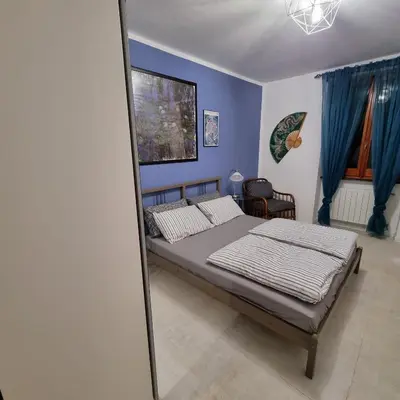 Letto o letti in una camera di B&B La Terrazza Sui Fieschi