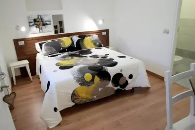 Letto o letti in una camera di Locanda Il Gigante