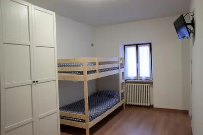 Letto o letti in una camera di Locanda Il Gigante