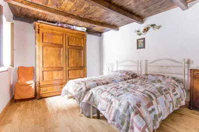 Letto o letti in una camera di Agriturismo La Calamaia