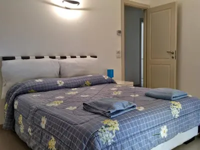 Letto o letti in una camera di Libra Flexyrent