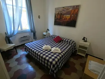 Letto o letti in una camera di A pochi passi dal mare by PortofinoVacanze