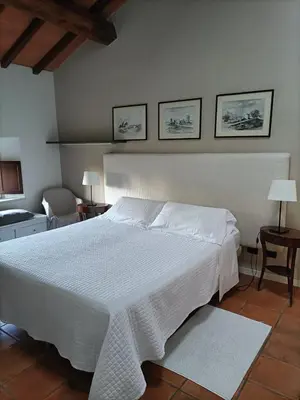 Letto o letti in una camera di La Villa delle Rose